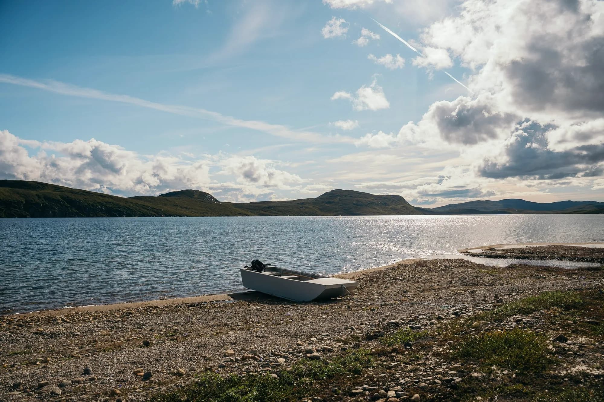 Boat crossing a Western Greenland fjord