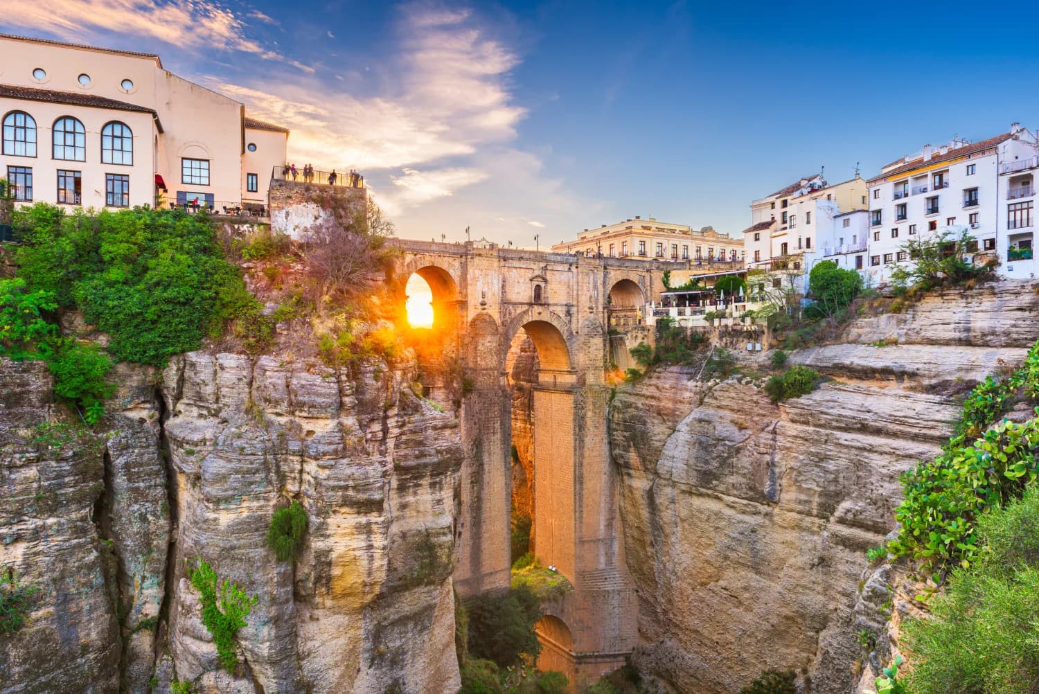The white town of Ronda above the El Tajo gorge and Puente Nuevo